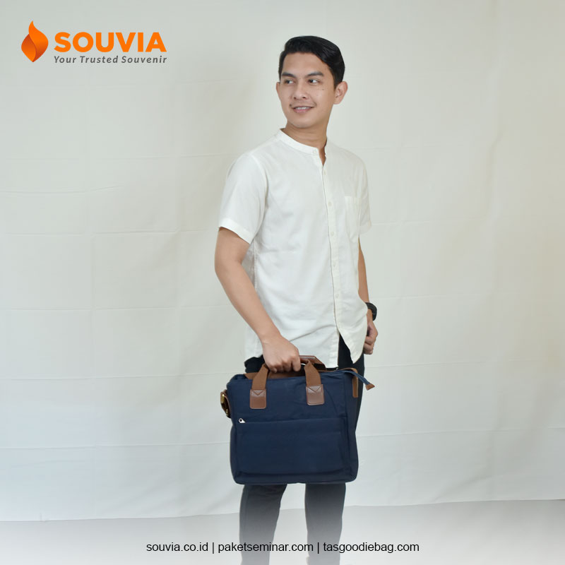 Tas selempang bahan kanvas dengan handle untuk ditenteng sebagai souvenir best seller G20 Bali